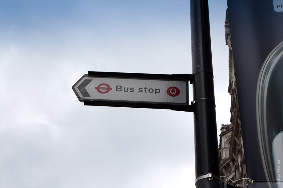 London bus stop with a letter code Q